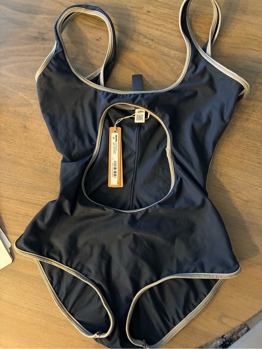 SKIMS navy blue swimsuit with gray trim